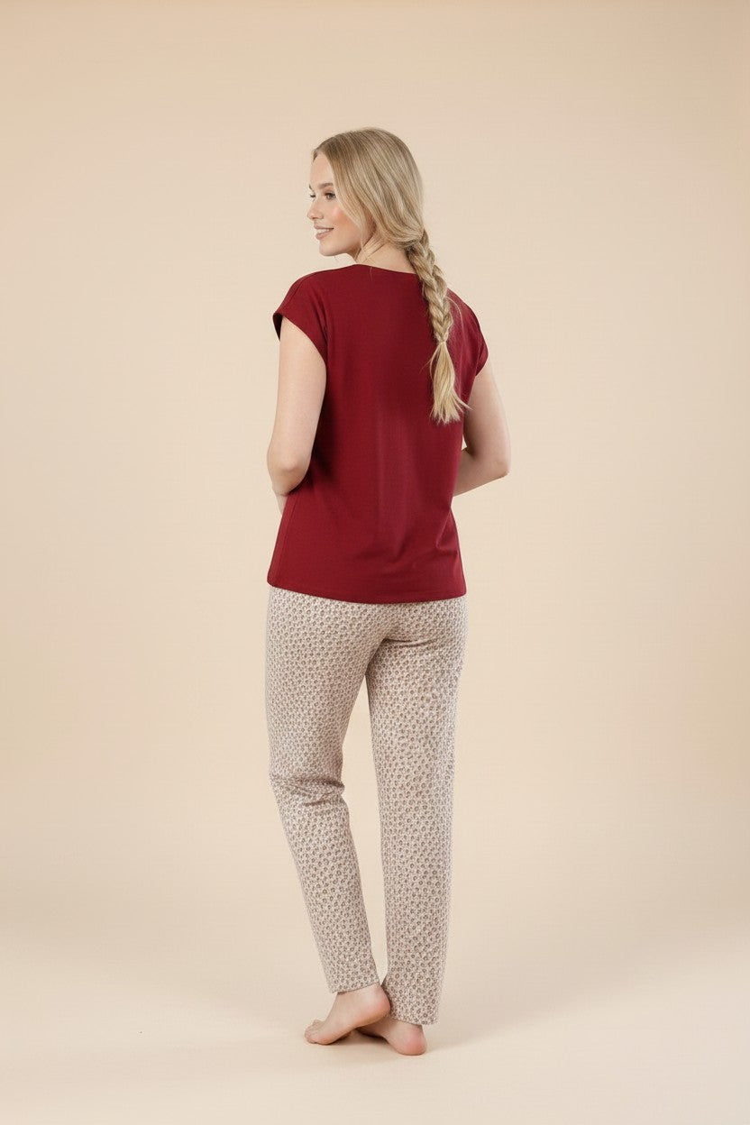 pyjama women's red cotton pajama set with a solid red top and patterned trousers, shown from the back